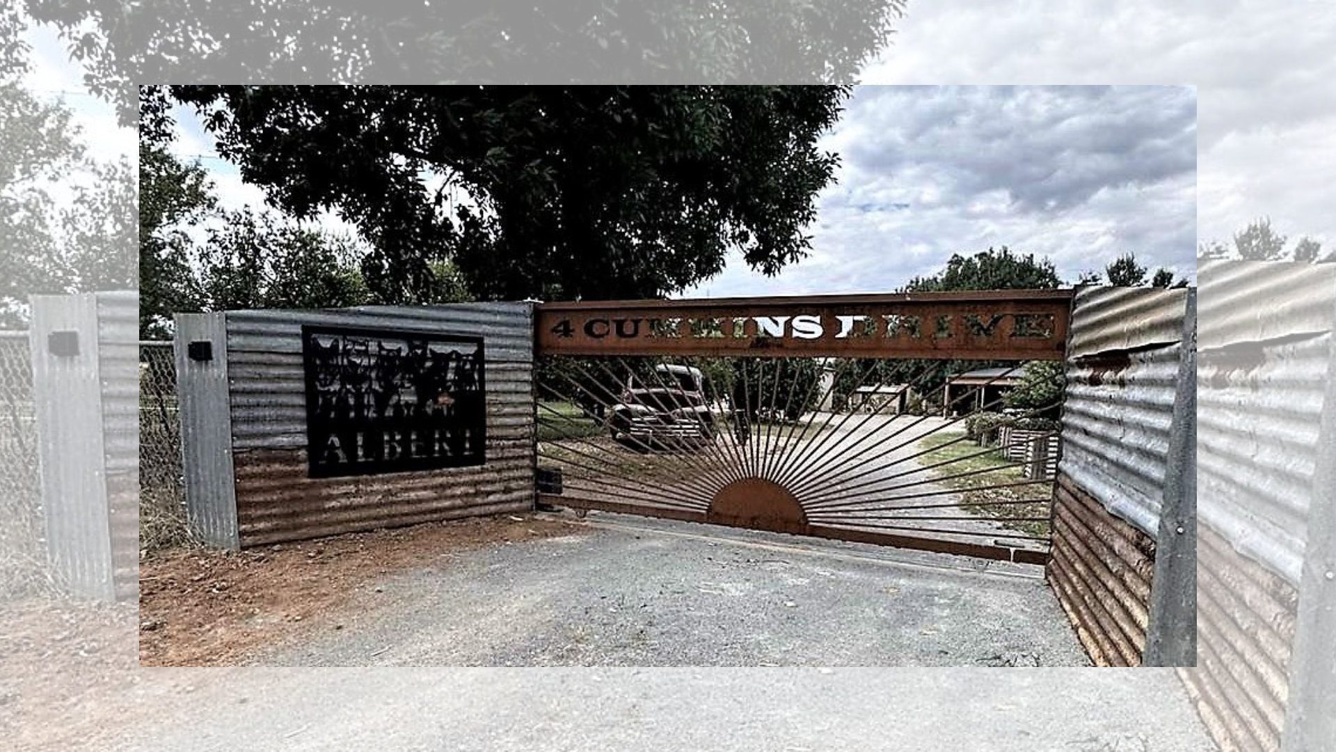 Rock Design Custom Signs with wording Albert and 4 Cummins Drive on the gate